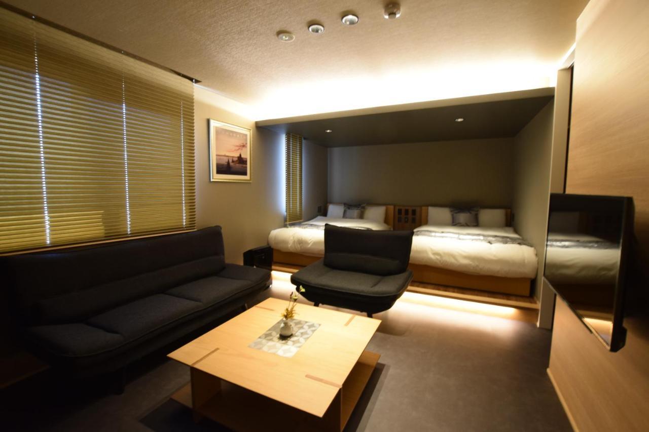 Апарт отель Grand Base Beppu Ekimae Экстерьер фото
