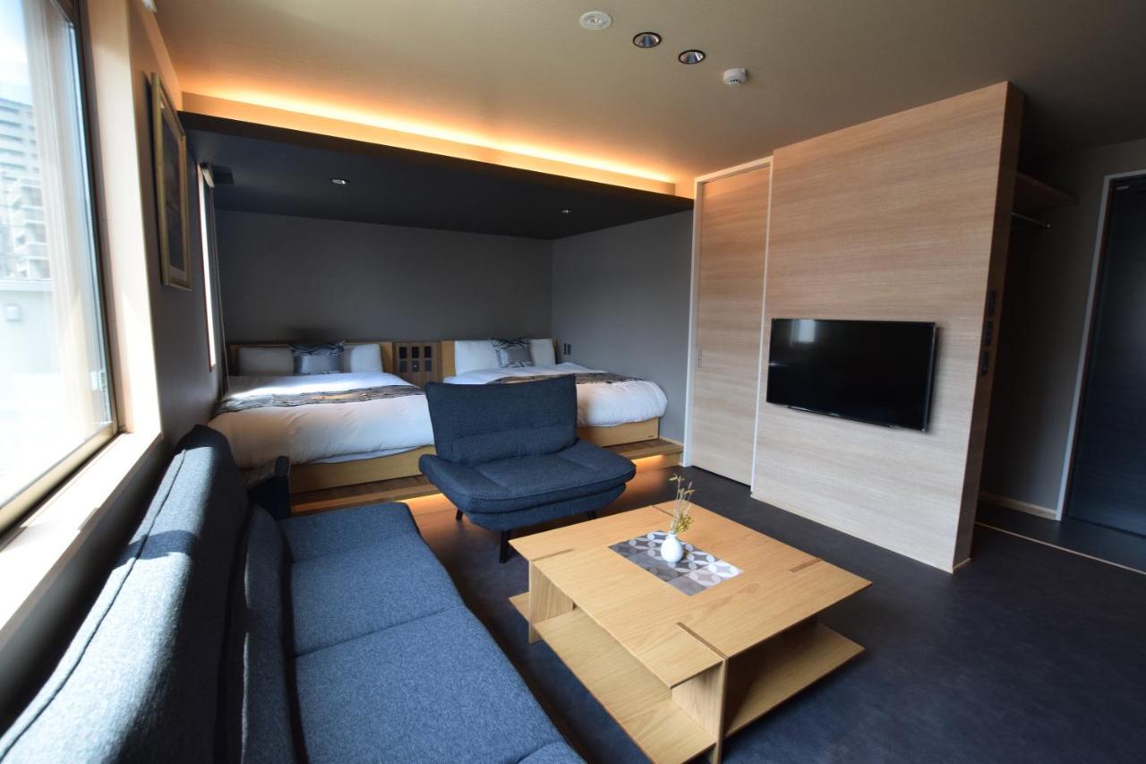 Апарт отель Grand Base Beppu Ekimae Экстерьер фото