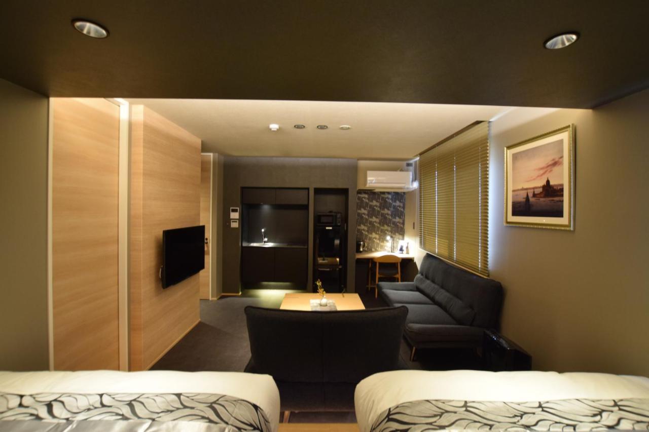 Апарт отель Grand Base Beppu Ekimae Экстерьер фото
